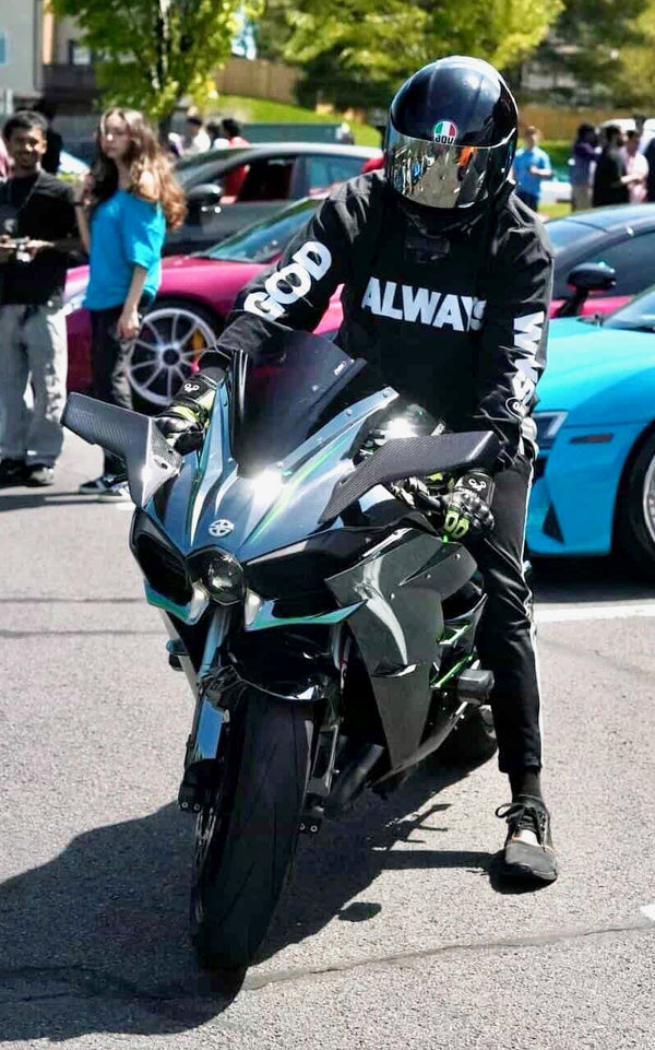 taeq sharabi on the kawasaki ninja h2 at a car meet